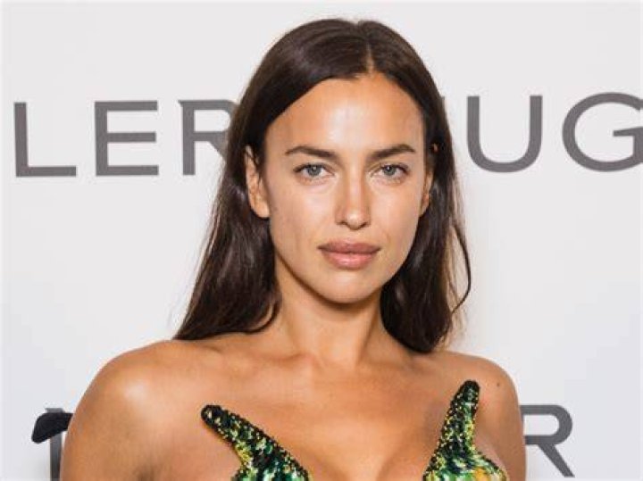 Irina Shayk puts her model figure on display while leaving morning