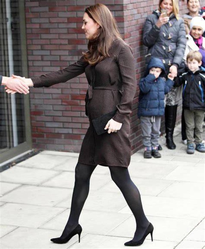 Pregnant Kate Middleton Visits Foster Care Center, Has Tea Bump Photo
