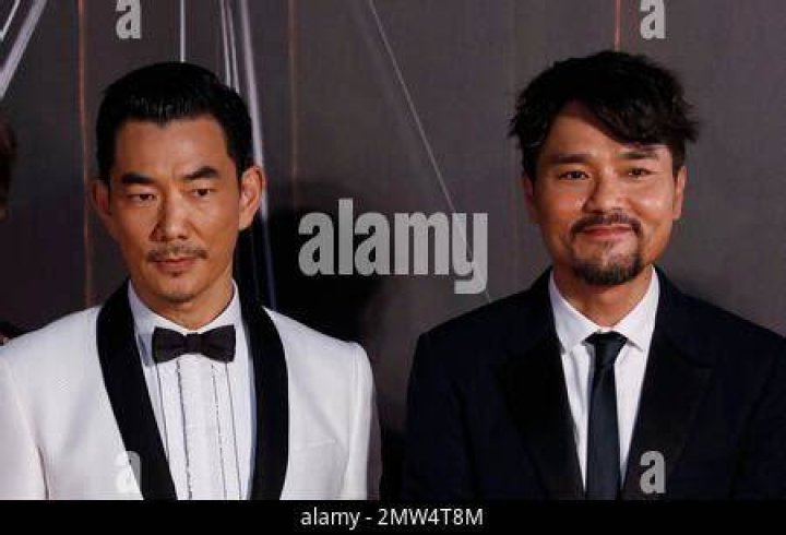 Taiwan actor Richie Ren, right, and his wife Tina Chen pose on the red